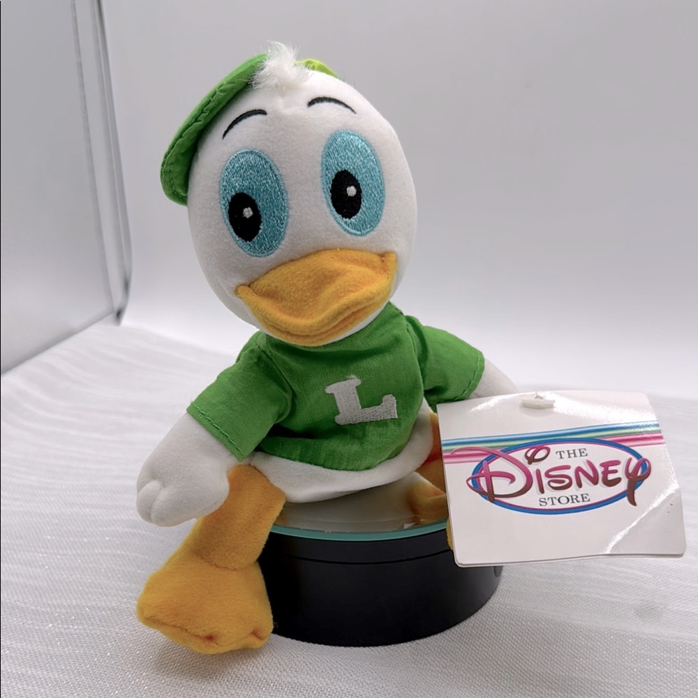 Disney LOUIE mini beanbag, exclusive Disney theme parks and store 6” sitting NWT
